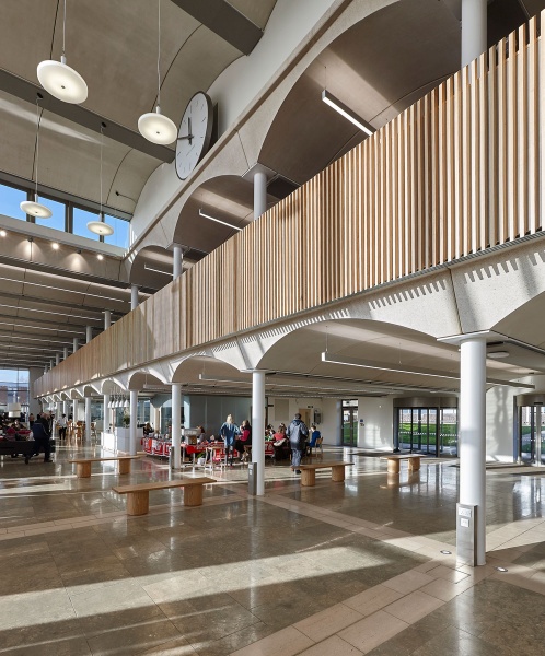 Our team designed and manufactured a range of acoustic products to compliment the design of the new Pavilion building and lecture theatres and classrooms at the newly built Clifton Campus at Nottingham Trent University.
Pavilion Building:
Our team custom made Ash slatted acoustic timber balustrade on a modular wood frame system in-corporating Absorber panels covered in Camira fabric to form bespoke panelling, which was then installed by our team.
For the upper work seating area in the Pavilion, RPG Absorber panels in Camira fabric were custom made and fitted with magnet fittings with Z bars to clear cable trays on all the high level metal beams and installed by our team.
Photos by Adam Coupe Photography NTP10.jpg