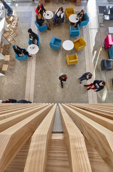 Our team designed and manufactured a range of acoustic products to compliment the design of the new Pavilion building and lecture theatres and classrooms at the newly built Clifton Campus at Nottingham Trent University.
Pavilion Building:
Our team custom made Ash slatted acoustic timber balustrade on a modular wood frame system in-corporating Absorber panels covered in Camira fabric to form bespoke panelling, which was then installed by our team.
For the upper work seating area in the Pavilion, RPG Absorber panels in Camira fabric were custom made and fitted with magnet fittings with Z bars to clear cable trays on all the high level metal beams and installed by our team.
Photos by Adam Coupe Photography NTP19.jpg