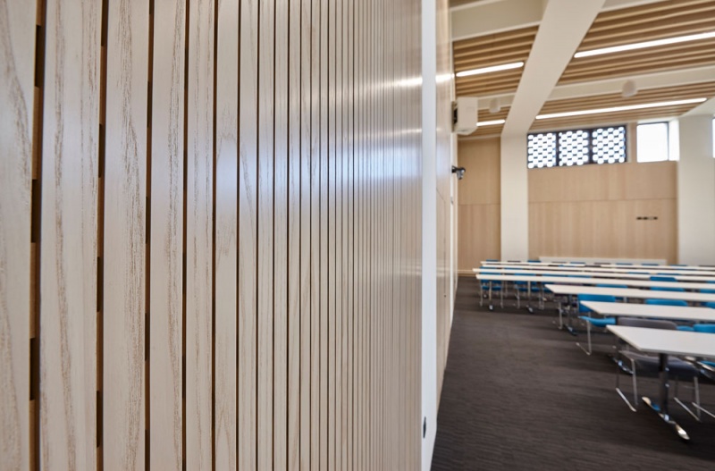 Main Lecture Theatres No. 1,2,& 3:
Lambri acoustic timber slotted panelling in Blond Ash finish was installed on the walls incorporating vent grills, with custom made ceiling fins consisting of Lambri Blond Ash over acoustic absorption.
Photos by Adam Coupe Photography NTH4.jpg