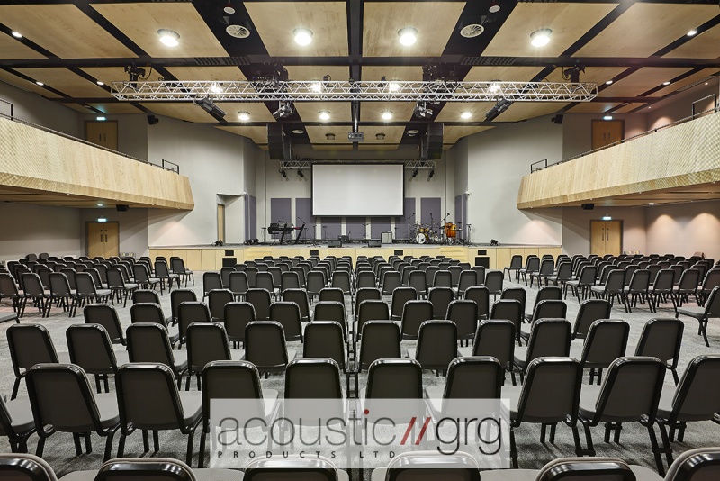 Our latest acoustic project at City Gates Church in London features a selection of bespoke products manufactured in our Kent workshop including custom made RPG Planaform Reflectors in lacquered Birch ply. Our team fitted the panels to the main ceiling and under the balconies to the design of the acoustician and architect. For the balustrade, our team formed Spigo Birch veneer panels on site and cut Spigo Birch acoustic panels to cover the balustrade framing. The stage features Lucia fabric wrapped RPG Absorbors, which were manufactured in our workshop and installed by our team. Project photos by Adam Coupe Photography Ltd. CG1 L.jpg